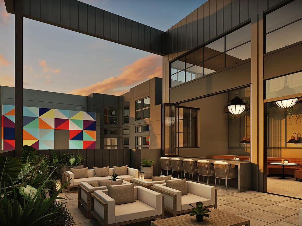 Rooftop deck with indoor/outdoor space showcasing stunning views.
