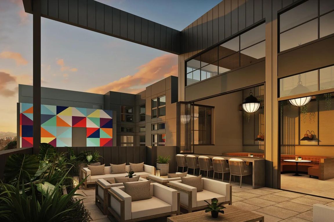 Rooftop deck with indoor/outdoor space showcasing stunning views.