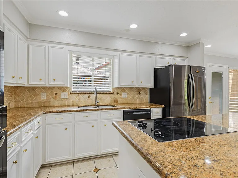 7715 Brush Wood Dr — Photo 12
