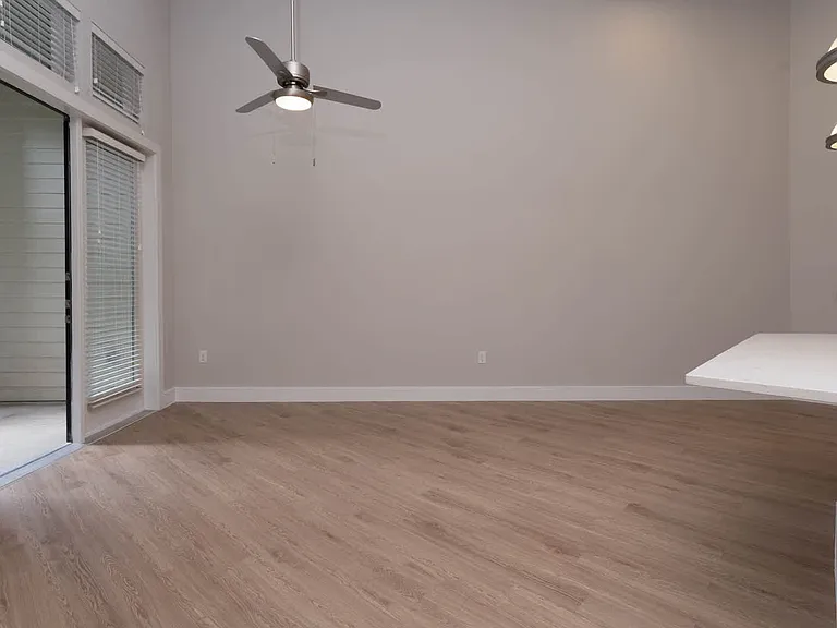 Living Room with Balcony and Hard Surface Flooring