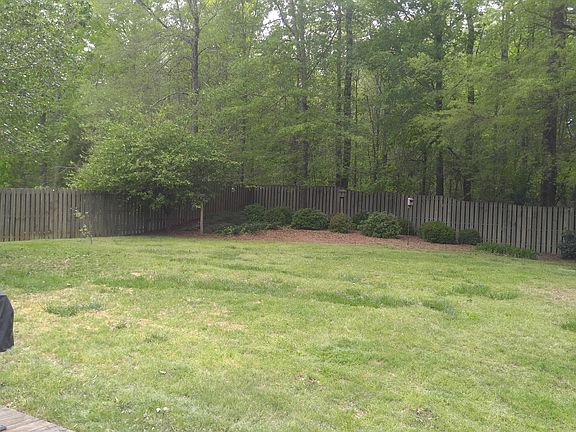 large landscaped backyard, f