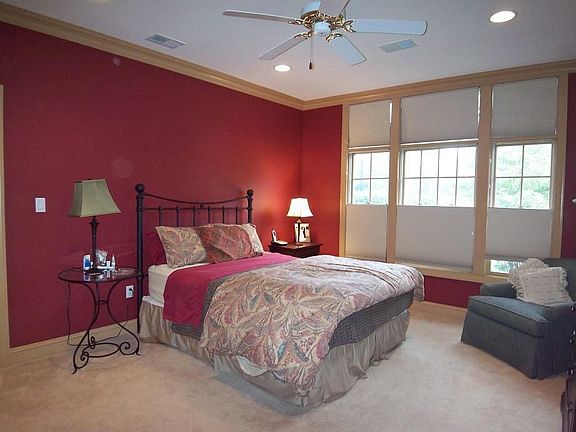 Master Bedroom with crown molding, recessed lighting & walk-in closet