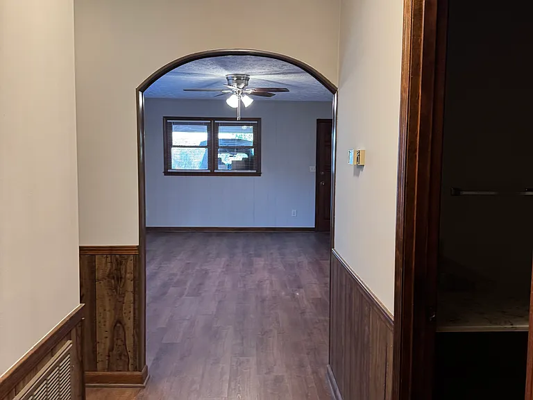Hall leading off the foyer to Den, Hall Bath and bedrooms