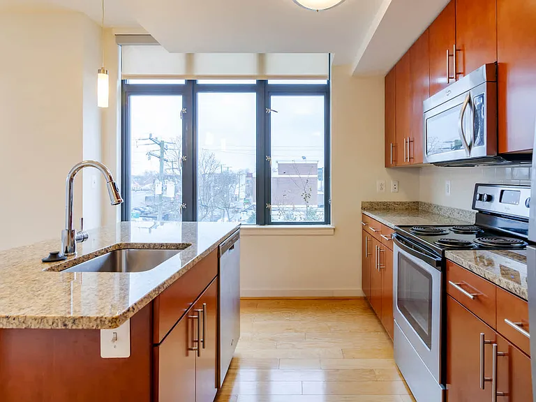 Kitchen with Stainless Steel Appliances and Cherrywood Cabinets