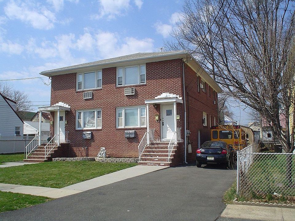 Side Driveway leads to back parking lot