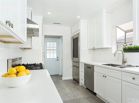 Quartz counters and custom cabinets