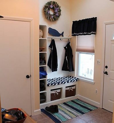 Entryway : Custom built bench and shelves with coat closet attached