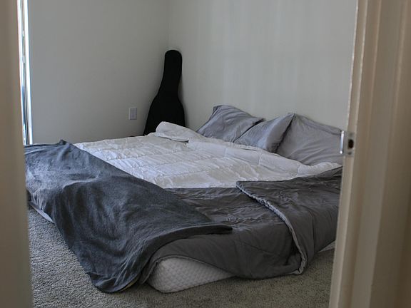 Can fit a king size bed comfortably. Access to balcony in bedroom.