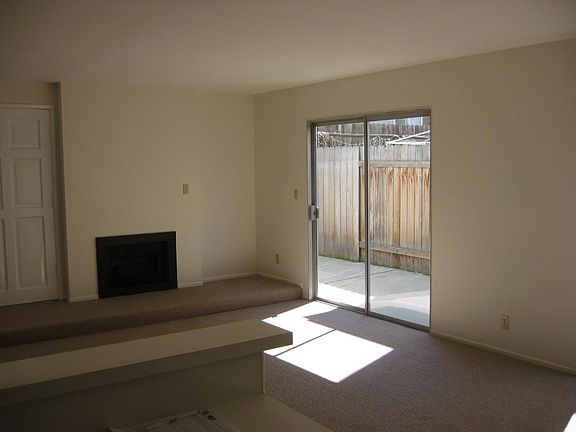 Family room and fireplace (from kitchen)