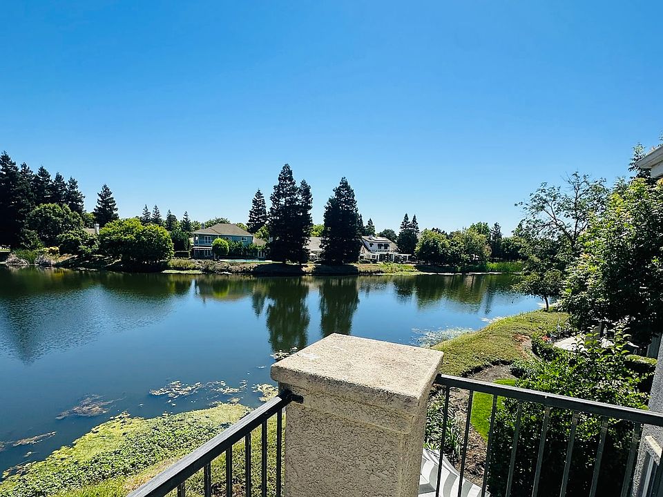 Another view from your private balcony, showcasing the stunning, tranquil waters of Teal Lake and the lush surroundings. This is the perfect spot to unwind and soak in the natural beauty of the community.