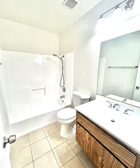Hallway bathroom with previous cabinet and floors