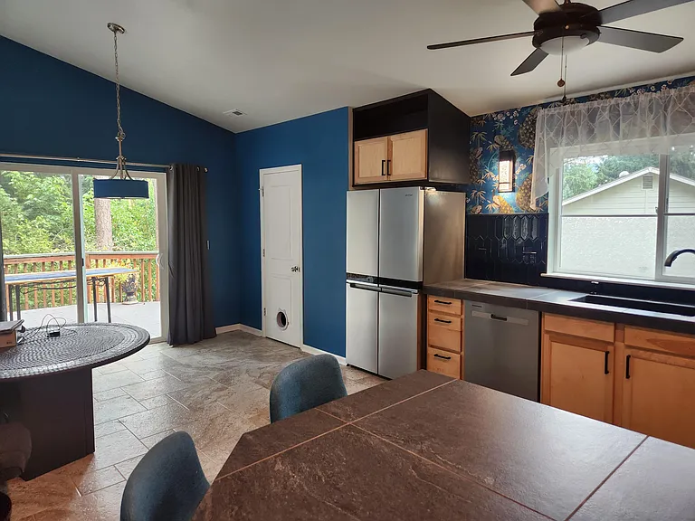 Refrigerator, Eating area, and slider to deck