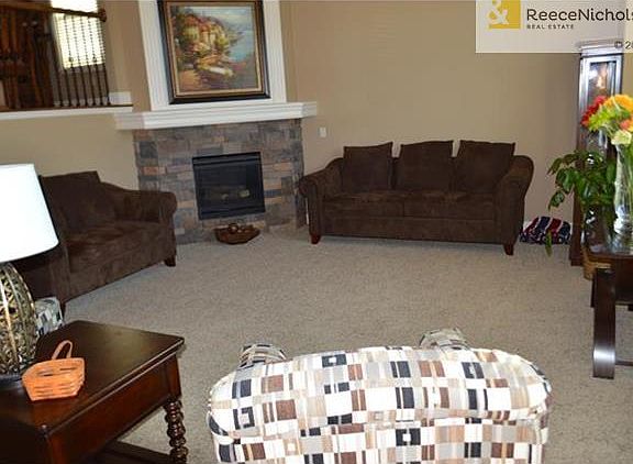 Kitchen overlooks the living room and entry