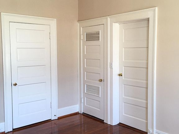Bedroom with left to right closet, HVAC, and bedroom door