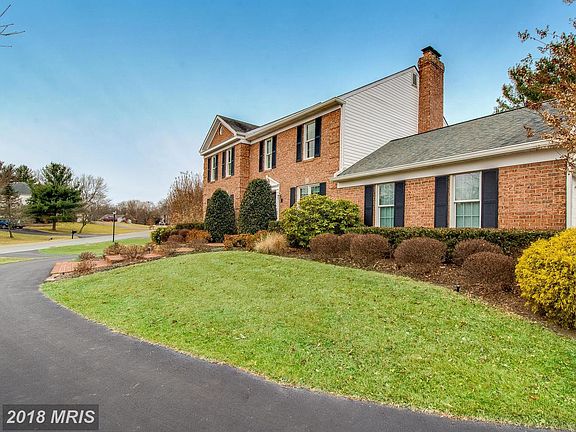 Front with circular driveway and 2 car garage!