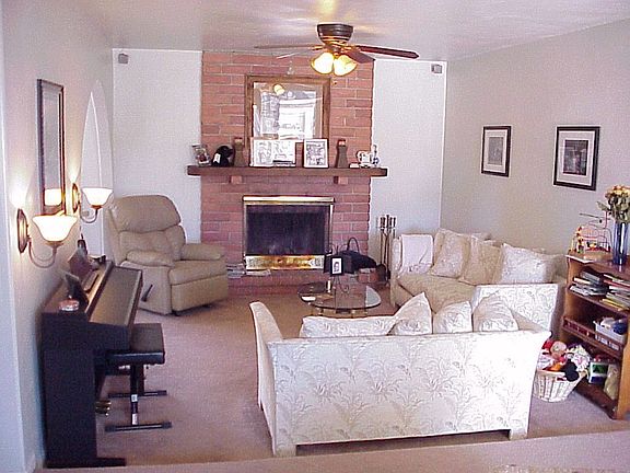 Open Living Room with gorgeous red block fireplace