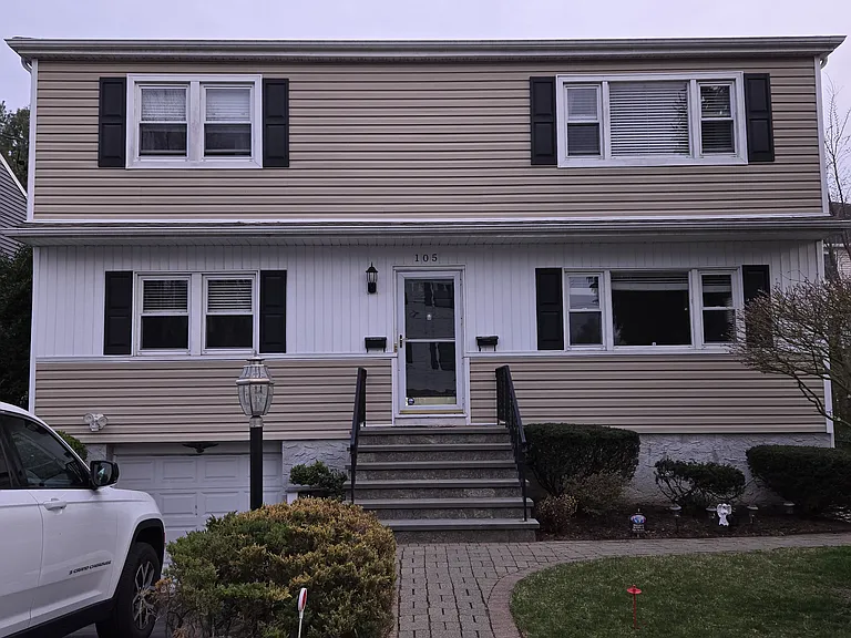 Beautifully maintained two family home.