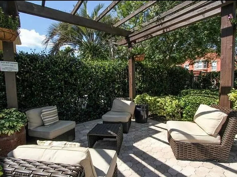 Under the trellis poolside at Mirabella