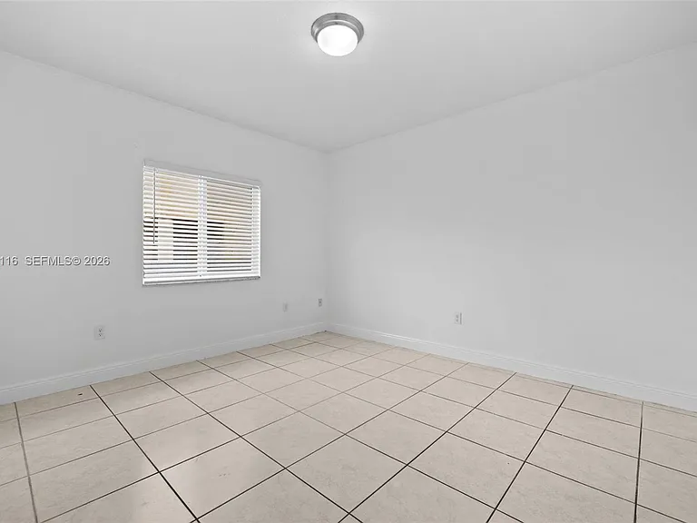 2421 W 78th St #104 — Photo 13