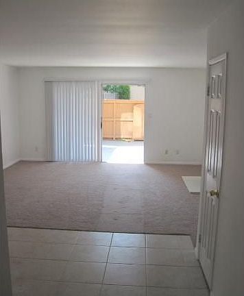Living room and large rear patio area