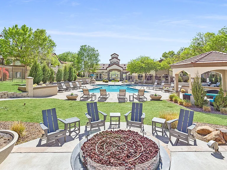 Enjoy cozy evenings by the firepit in our stunning poolside patio area
