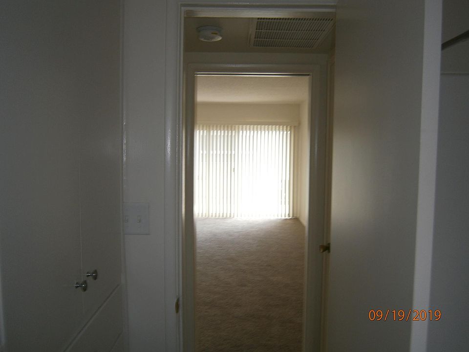 LOOKING OUT TO THE LIVING ROOM.