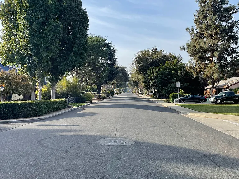Peaceful, tree-lined neighborhood with ample street parking.