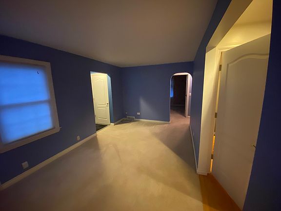 Living room to first bedroom and master bath