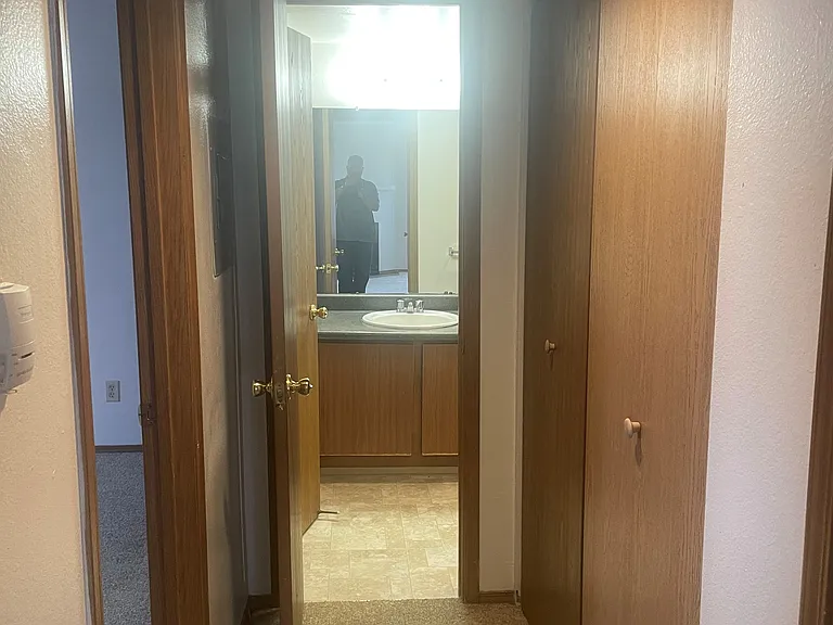 hallway and laundry to the right