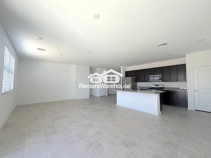 8825 W Albeniz Pl — Photo 5