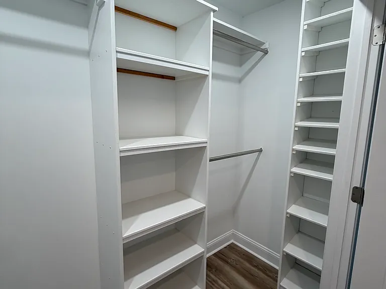 Custom closets in both the master and secondary bedrooms.