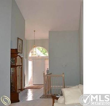 Foyer With Vaulted Ceiling