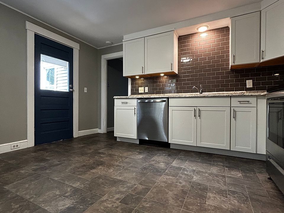 Large kitchen with full-sized appliances.