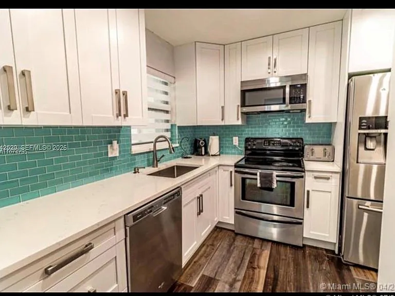 3833 Cocoplum Cir #3593 — Photo 11