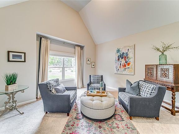 Image 4: Second Sitting Area Off the Foyer