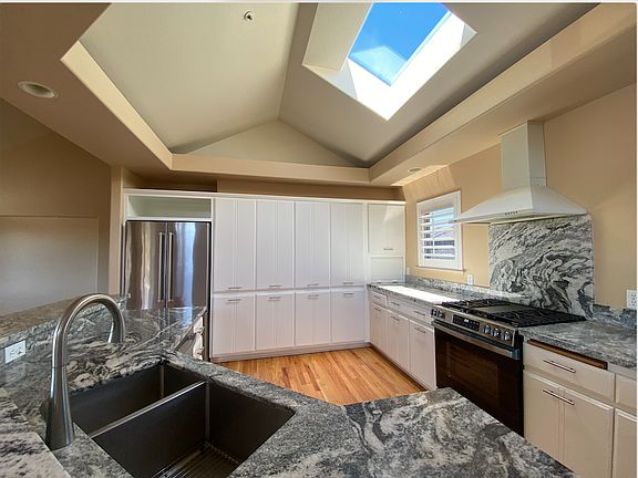 Upstairs -- kitchen with all new appliances.