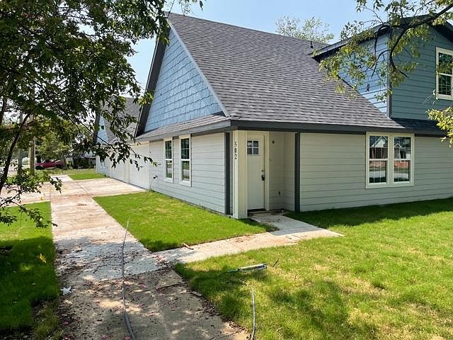 Max Privacy for a Duplex. The ONLY common wall between the units is the Garage and the entrances are on opposite sides of structure. Entrance to 502 W Owings.