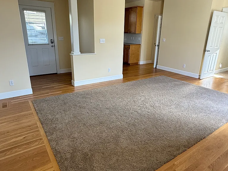 Living/Dining looking towards Entry and Kitchen.