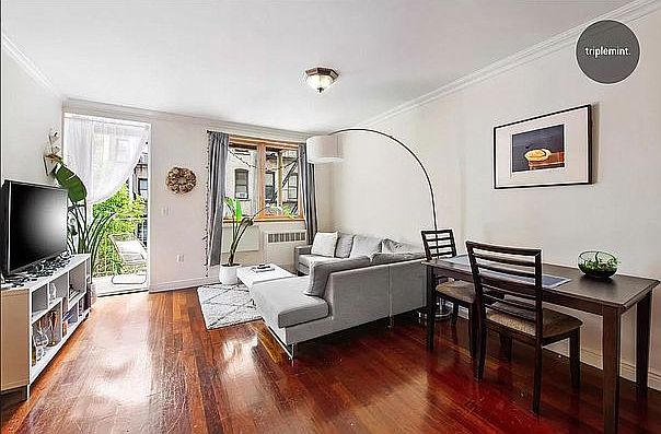 1st image of 420 E 11th St APT 4B