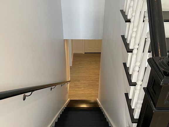 sStairs down to bonus room/home office