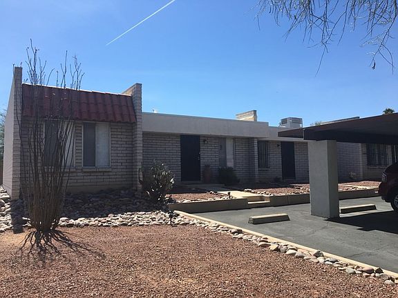 Car Port with one covered and one uncovered parking.