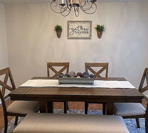 Dining with hardwood floors