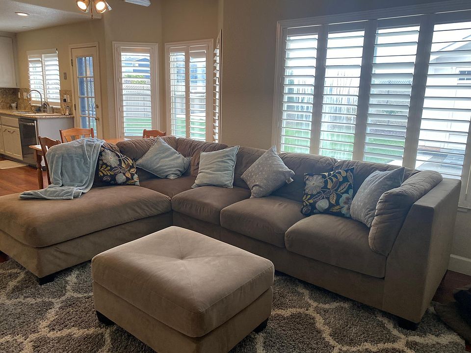 Family room with lots of window. Love this.