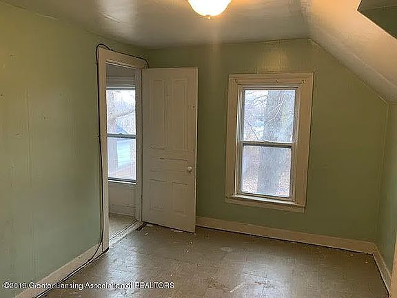 3rd image of 114 E 1st St