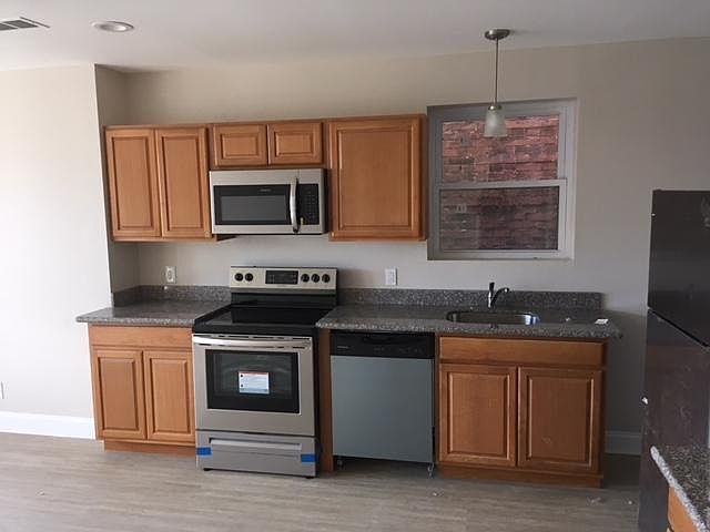 Kitchen with new stainless steel appliances