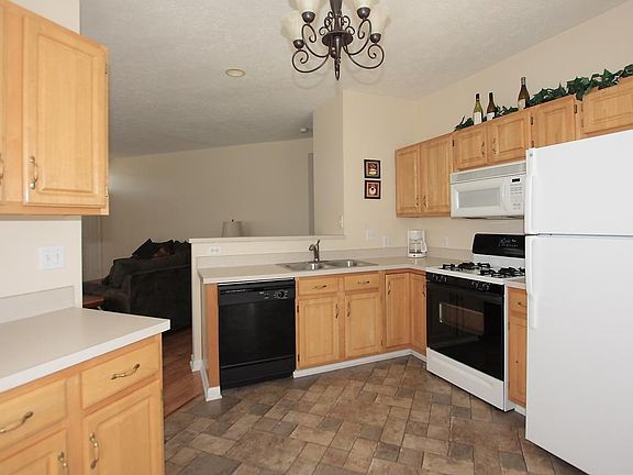 The kitchen opens out into the living and dining area