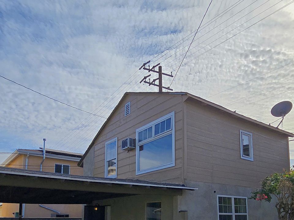 Exterior with 2 carport parkings.