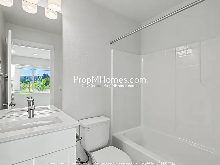 7527 NW Eleanor Ave — Photo 19