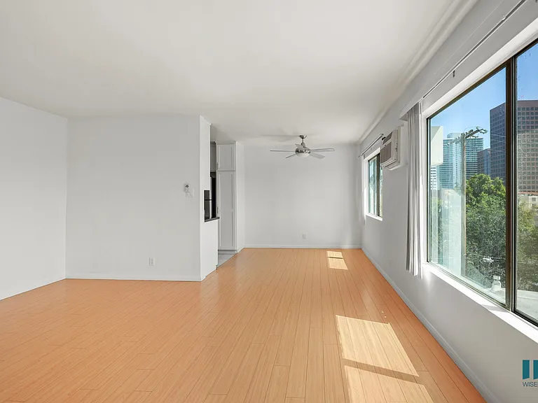 Dining Room with Large-Size Windows Providing Natural Light