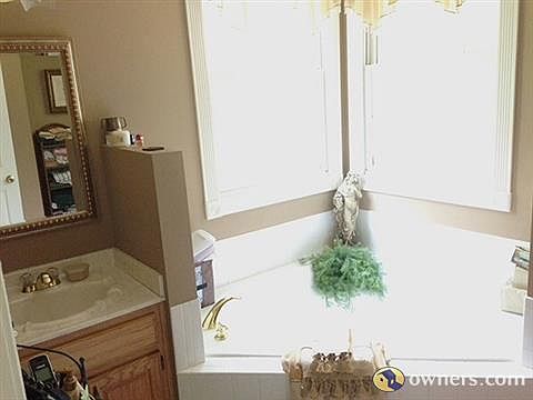 Garden Tub and His/Her Vanities in Master Bath